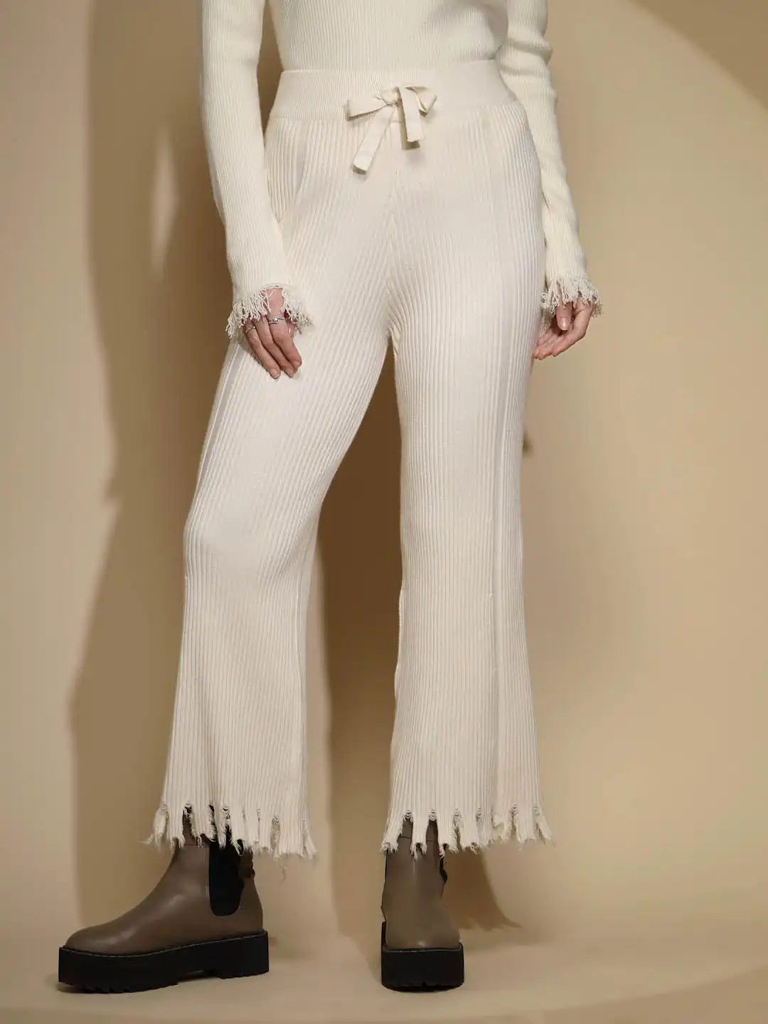 Off White Solid Knitted Mid Rise Fringed Lower