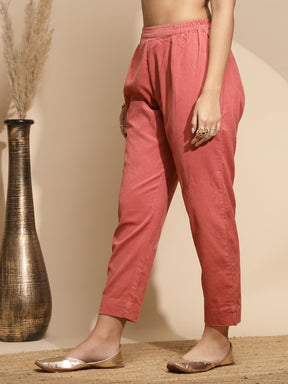 Peach Solid Cotraise Mid Rise Loose fit Pants For Women