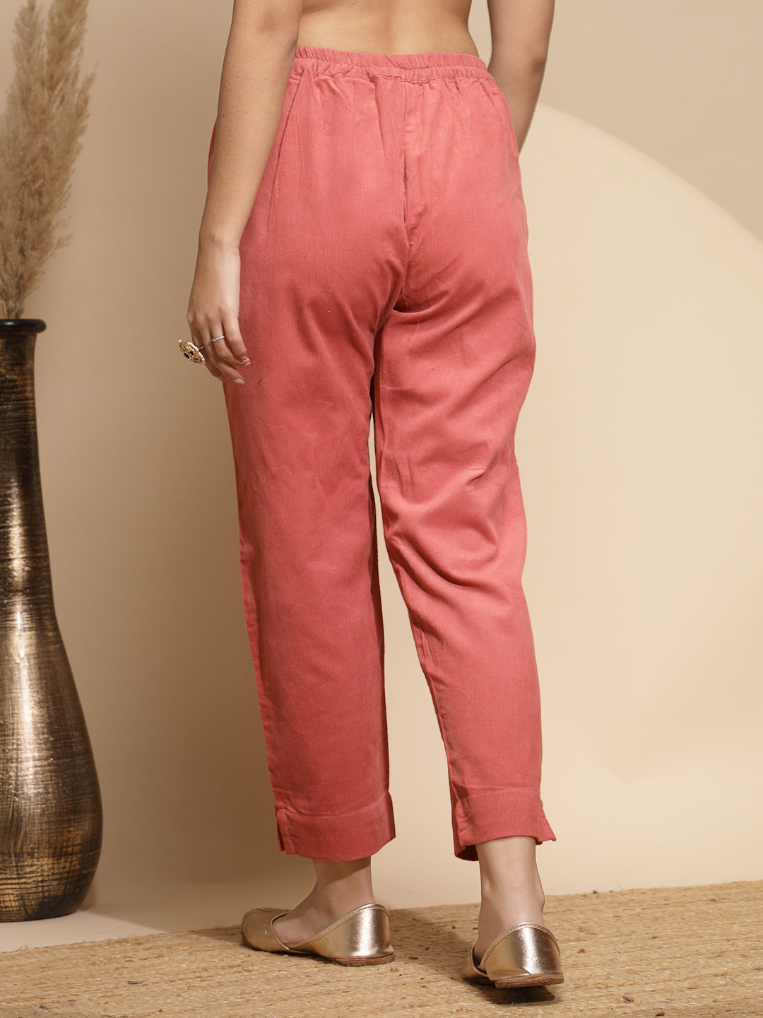 Peach Solid Cotraise Mid Rise Loose fit Pants For Women