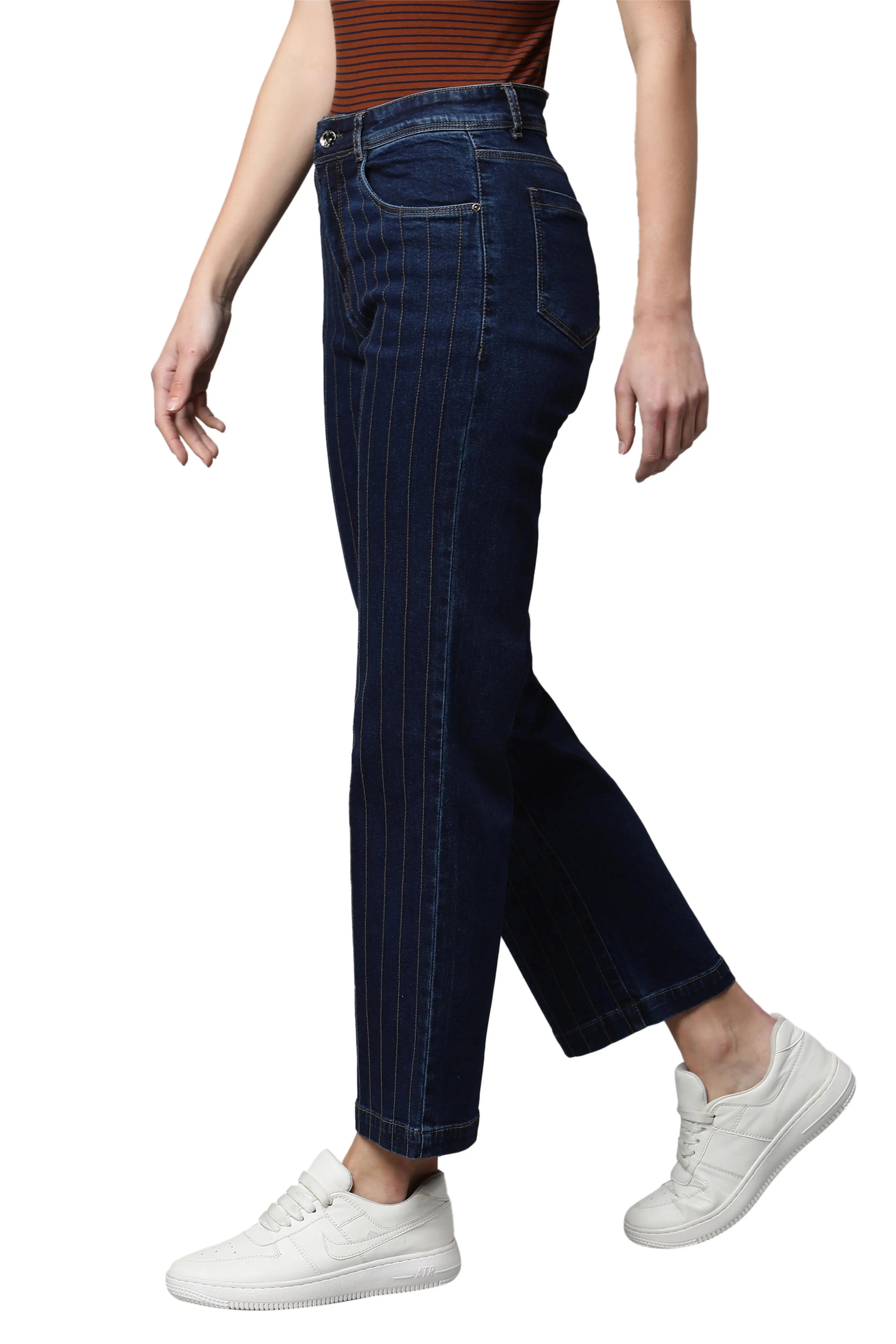 women dark blue jeans