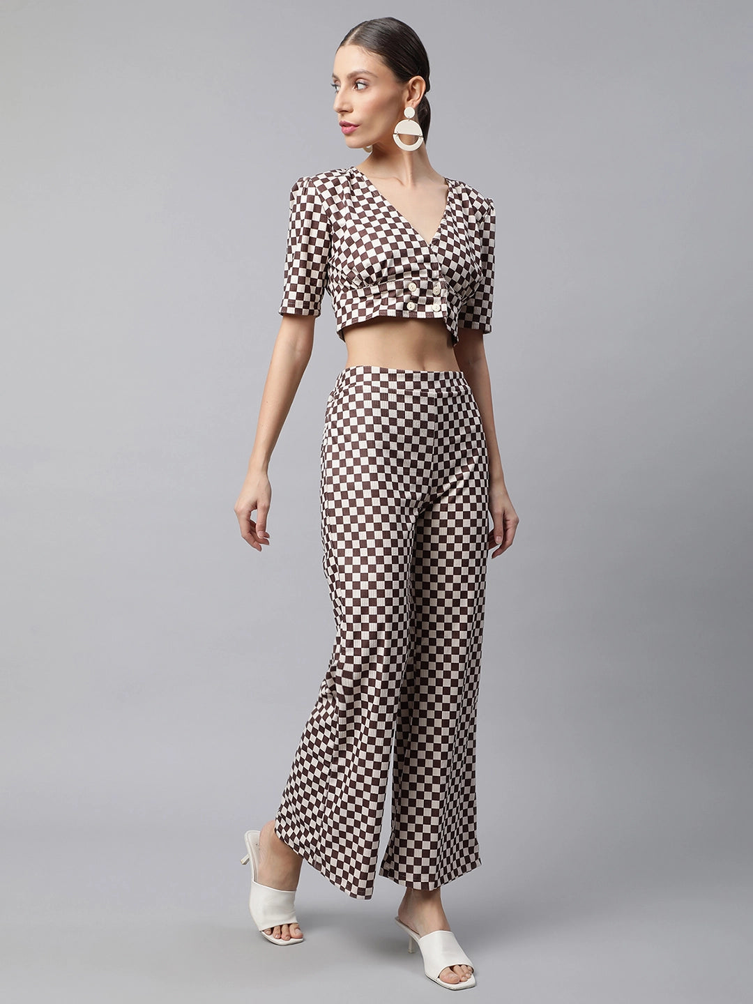 women brown off white crop top flared pants coord set
