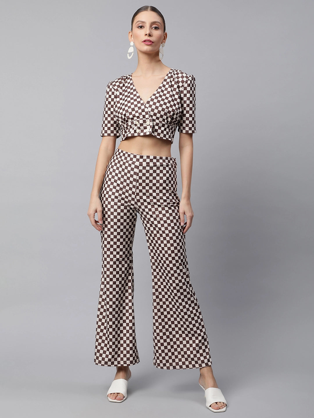 women brown off white crop top flared pants coord set
