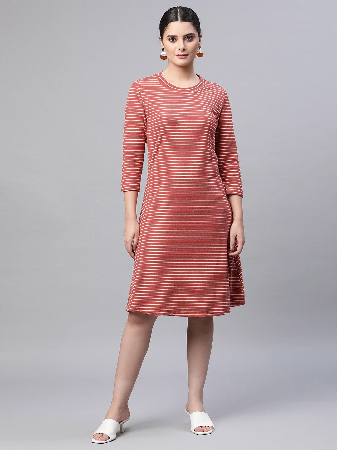 women round neck straight quarter sleeves rust printed regular fit hosiery dress