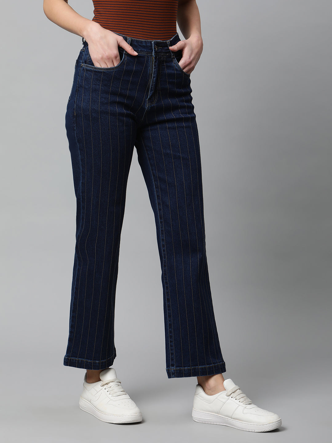 women dark blue jeans