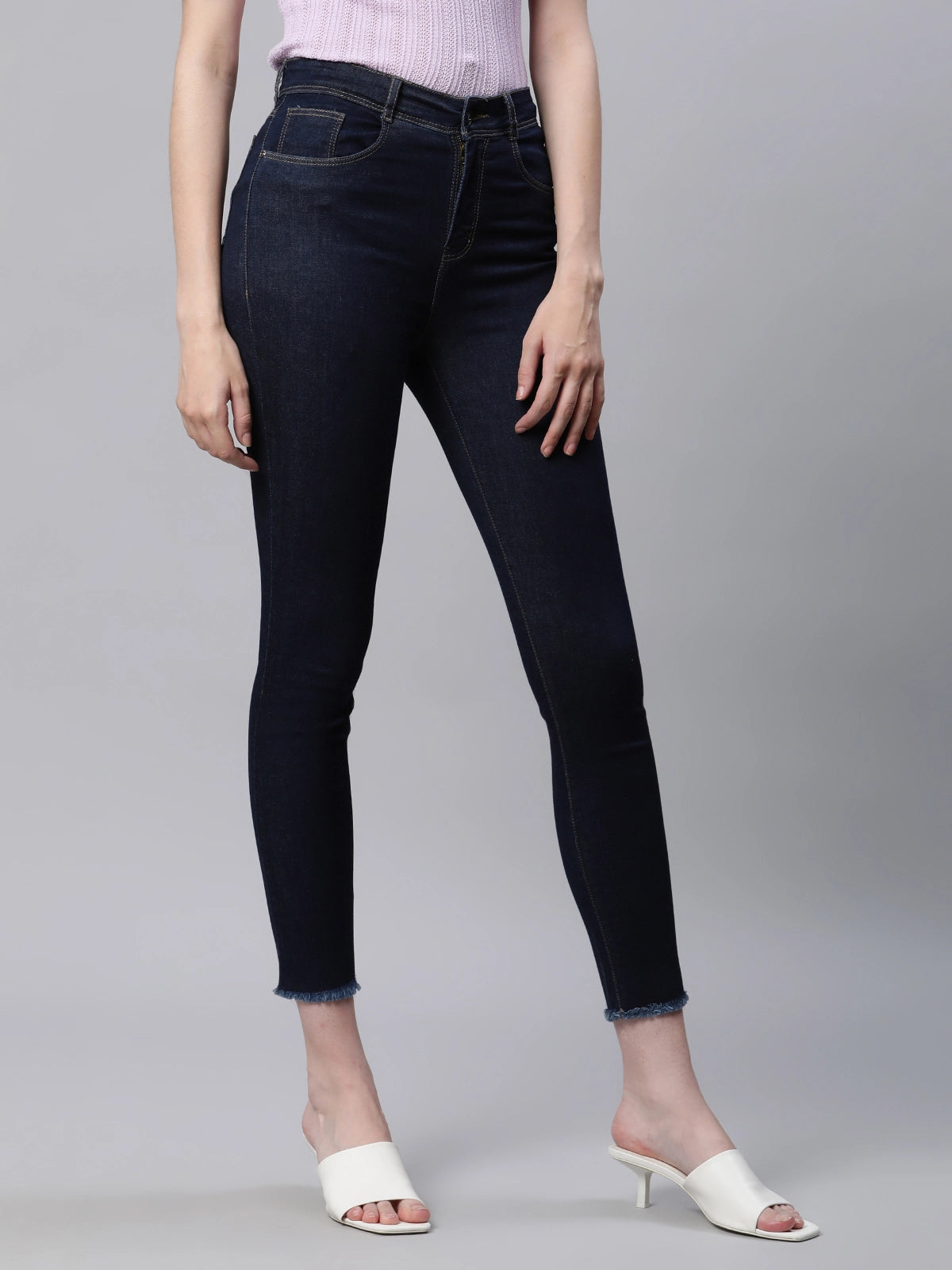 women lightly washed mid rise blue skinny jeans