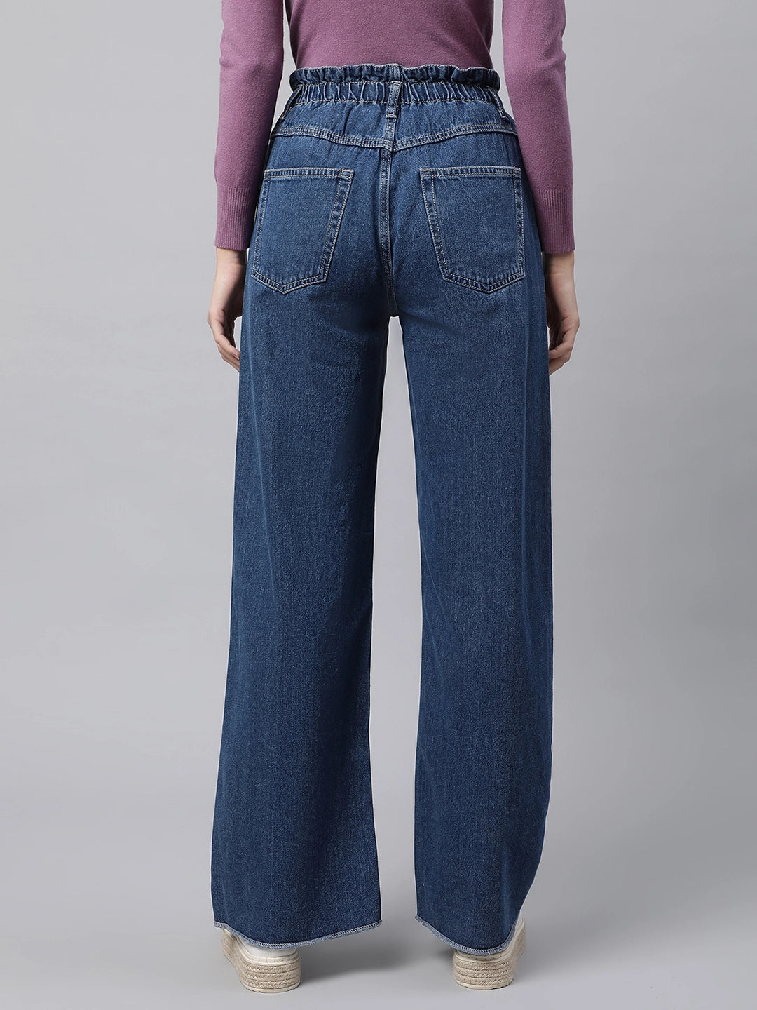 women mid blue jeans