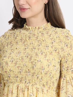 women yellow pearl embellished flared dress