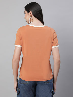 women orange round neck embellished top